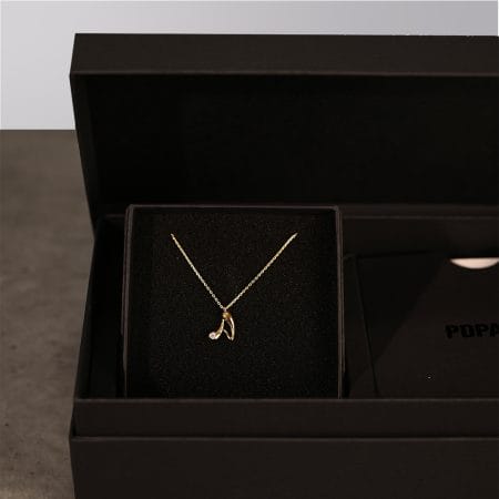 A box of jewelry from the brand PDPaola.