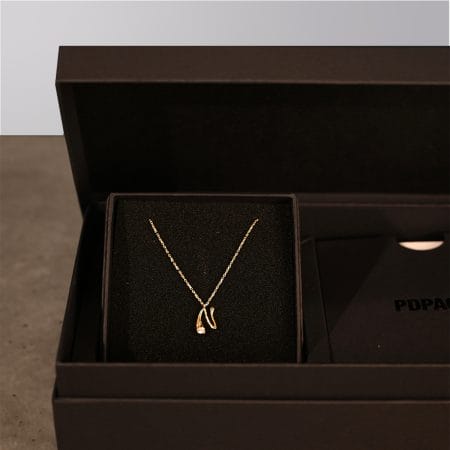 A box of jewelry from the brand PDPaola.