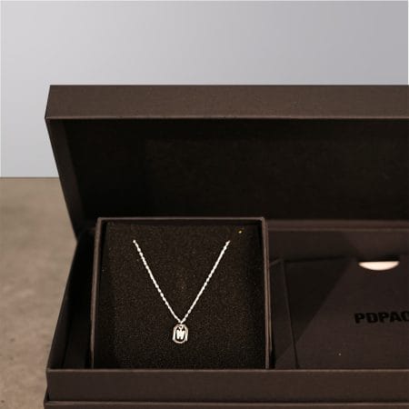 A box of jewelry from the brand PDPaola.