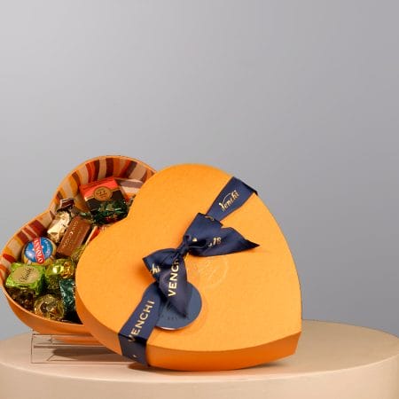 A box of chocolates shaped in a heart, made by the Venchi brand.