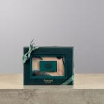 A green chocolate box made by Bostani.
