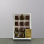 A chocolate box of 12 pieces made by Bostani.