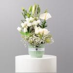 Green flower vase with anthurium, tulip and lily for Saudi National Day