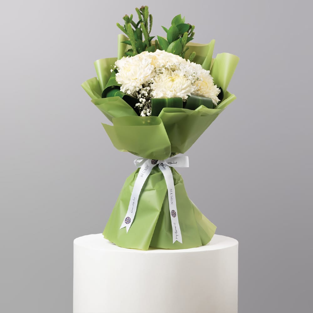 Flower bouquet in green wrap with tulip and baby orchid for Saudi National Day