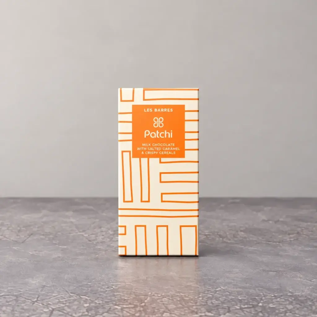 An orange box of chocolate with Patchi.