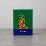 A green and blue card holder with the image of a tiger.